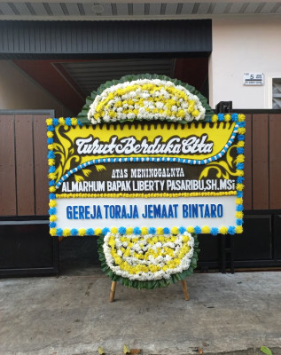 Papan Bunga Duka di Uut Murung